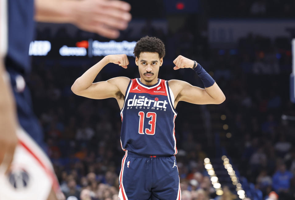 Feb 23, 2024; Oklahoma City, Oklahoma, USA; Washington Wizards guard Jordan Poole (13) gestures after his team scores against the Oklahoam City Thunder during the second quarter at Paycom Center. Mandatory Credit: Alonzo Adams-USA TODAY Sports