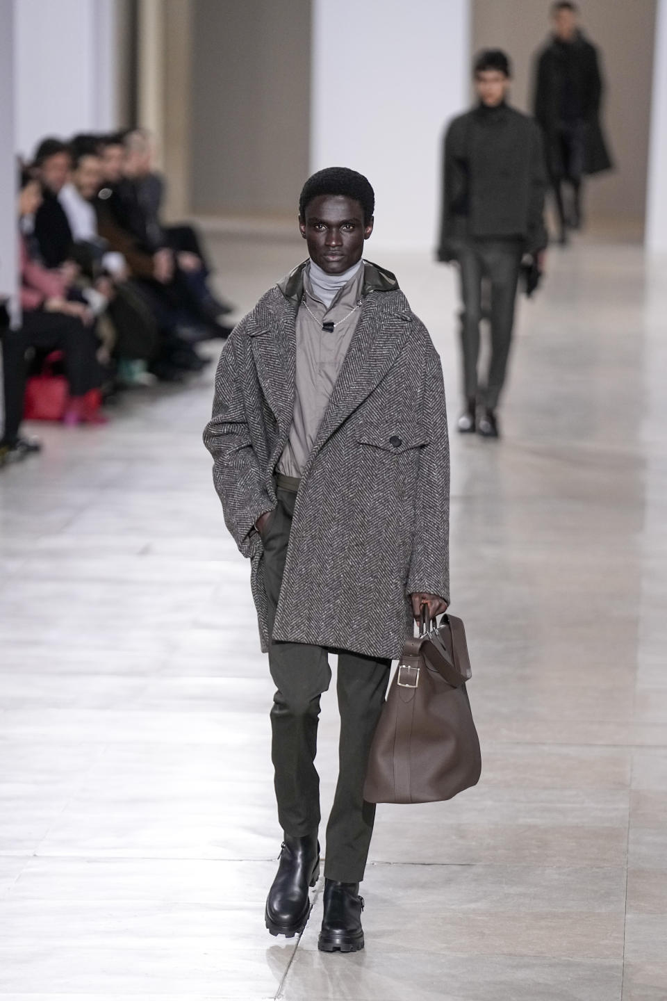 A model wears a creation for Hermes as part of the Menswear ready-to-wear Fall-Winter 2024-2025 collection presented in Paris, Saturday, Jan. 20, 2024. (AP Photo/Michel Euler)