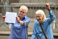 <p>Phyllis Siegel (left) and Connie Kopelov celebrate after they become the first same-sex couple to wed at Manhattan's City Clerk's Office. On July 24, New York became the sixth state allowing same-sex marriages — this was the first day couples were allowed to obtain a license and participate in a wedding ceremony. </p>