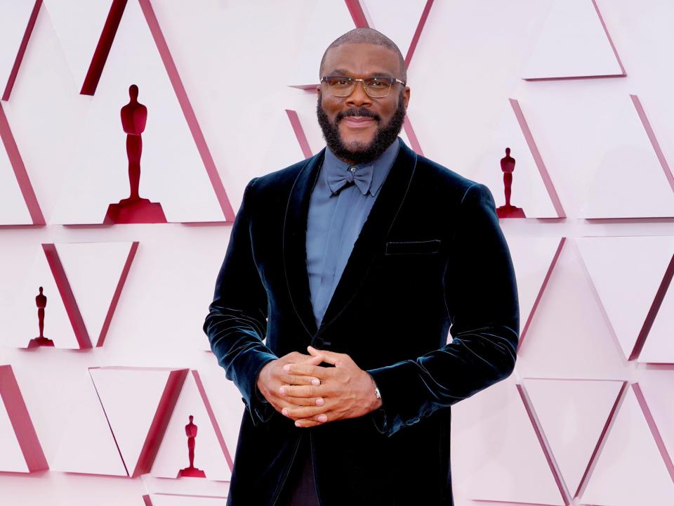 Tyler Perry poses at the Oscars.