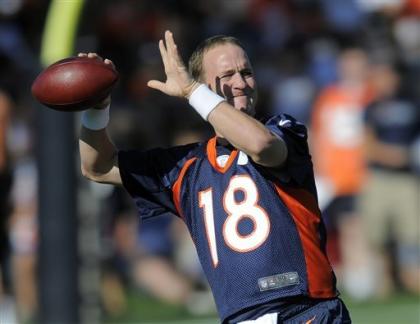 Denver Broncos Porn - Peyton Manning gets rockstar treatment at Broncos camp but his arm remains  mystery