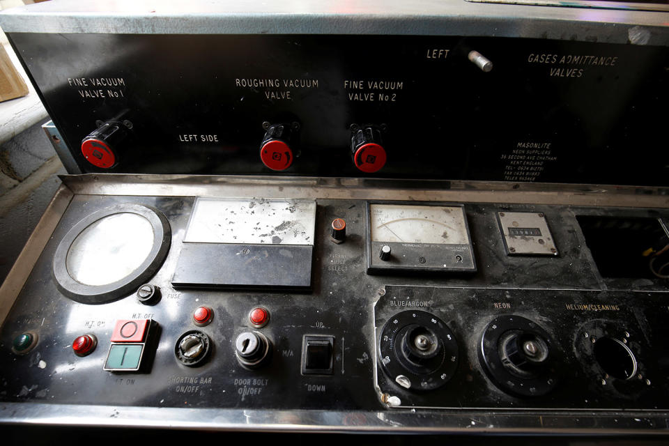 <p>The control panel for the pump that is used for creating the vacuum and filling glass tubes with the correct gasses needed to create the different colours in neon artworks is seen in God’s Own Junkyard workshop in Rainham, east London, Britain, May 17, 2017. The neon pump is over 30 years old. (Photo: Russell Boyce/Reuters) </p>