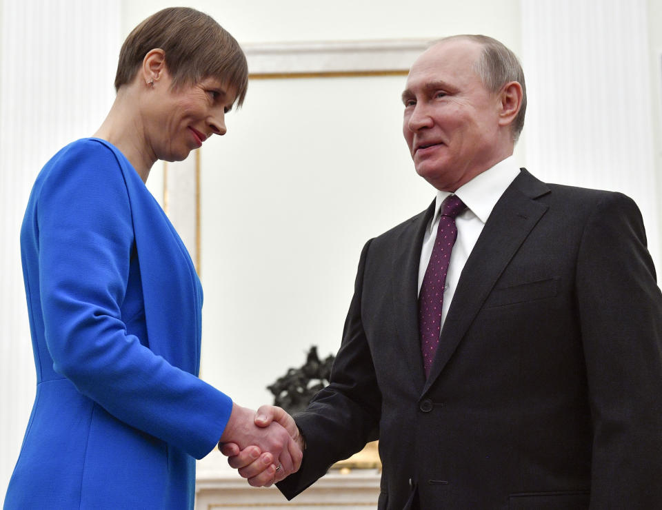 Russian President Vladimir Putin, right, shakes hands Estonia's President Kersti Kaljulaid at the Kremlin in Moscow, Russia, Thursday, April 18, 2019.Thursday's meeting between the presidents of Russia and Estonia is the first one for the leaders of the two neighbouring countries for nearly a decade. (Alexander Nemenov/Pool Photo via AP)