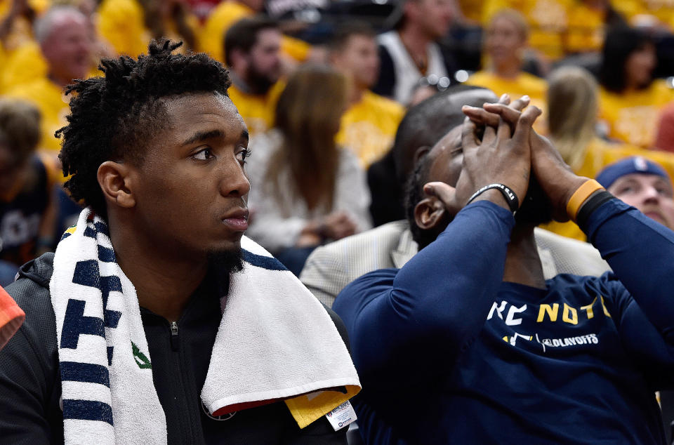 Donovan Mitchell (left) struggled to the worst performance of his young postseason career, and Jae Crowder (right) and the rest of the Jazz felt the pain of a blowout loss. (Getty)