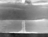 FILE - The stem of a hydrogen bomb, the first such nuclear device dropped from a U.S. aircraft, moves upward through a heavy cloud and comes through the top of the cloud, after the bomb was detonated over Namu Island in the Bikini Atoll, Marshall Islands on May 21, 1956. For decades, the tiny Marshall Islands has been a stalwart American ally. Its location in the middle of the Pacific Ocean has made it a key strategic outpost for the U.S. military. (AP Photo, File)