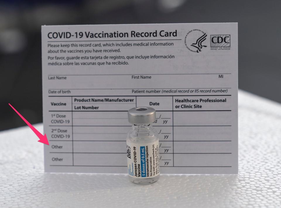 a cdc vaccine card with an arrow pointing at the line that says 'other' for additional doses of vaccines