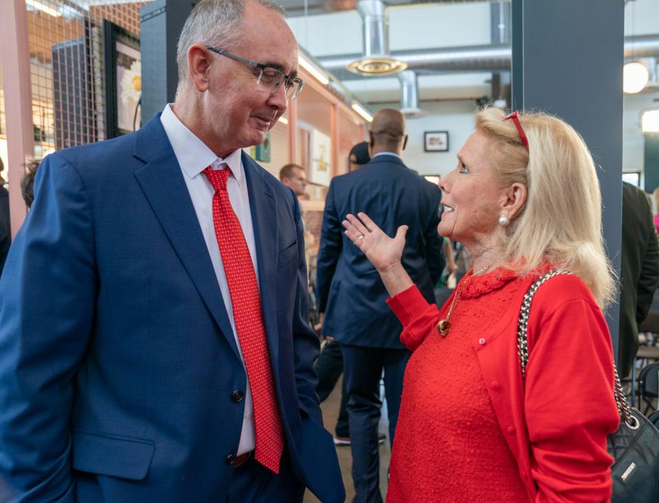 UAW President Shawn Fain, left, speaks with U.S. Rep. Debbie Dingell, D-Ann Arbor, after Michigan Gov. Gretchen Whitmer delivers her "What's Next" Address that outlines her legislative priorities for the fall at the Lansing Shuffle in Lansing on Wednesday, Aug. 30, 2023.