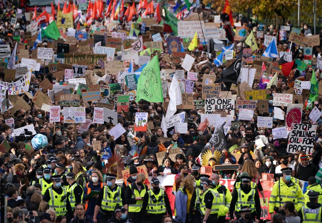 Demonstrators during the Fridays for Future Scotland march through Glasgow during the Cop26 summit on Friday (Andrew Milligan/PA) (PA Wire)