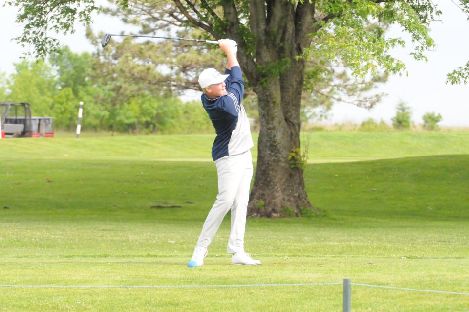 Sacred Heart's Walker Tuttle tees off during the Class 2A state golf championships Monday, May 23 2022 at Emporia Municipal Golf Course.