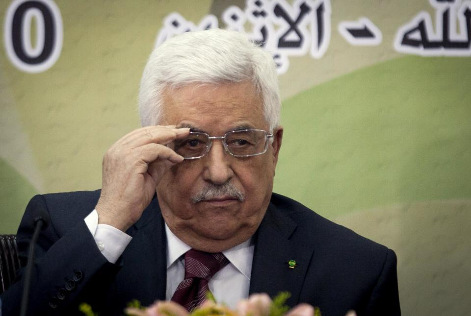 Palestinian President Mahmoud Abbas attends a meeting of the Fatah revolutionary council in the West Bank city of Ramallah, Monday, March 10, 2014. (AP Photo/Majdi Mohammed)