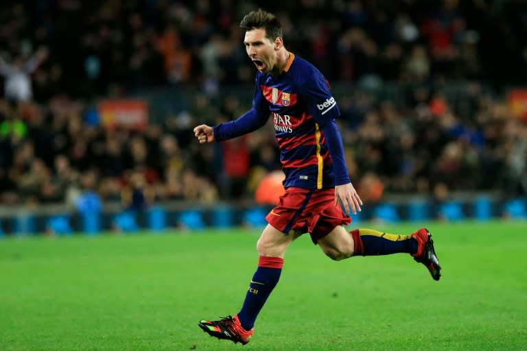 Barcelona's forward Lionel Messi celebrates after scoring during the Spanish Copa del Rey round of 16 first leg football match FC Barcelona vs RCD Espanyol at the Camp Nou stadium in Barcelona on January 6, 2016