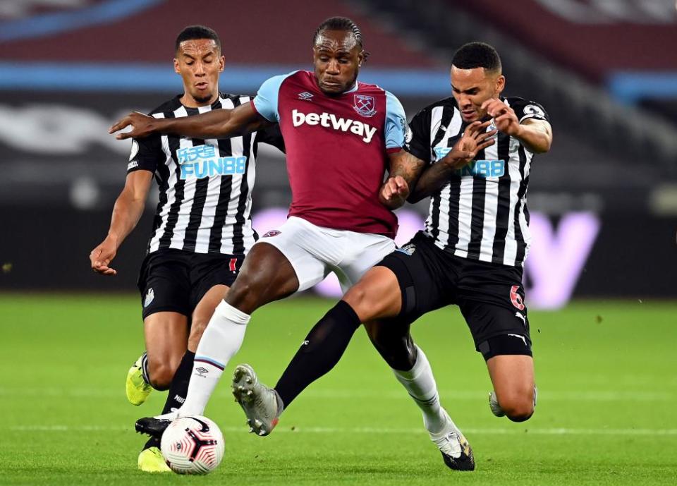 West Ham’s Michail Antonio being tackled by Newcastle's Isaac Hayden and Jamaal Lascelles