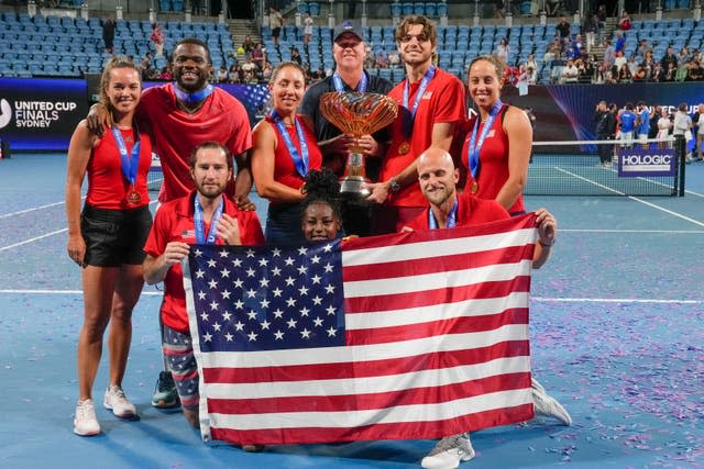 The United States team pose with the trophy after defeating Italy to win the United Cup in Sydney (Mark Baker/AP).