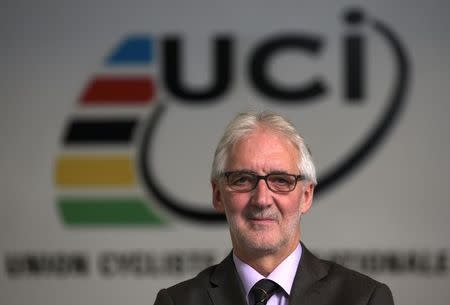 Britain's Brian Cookson, President of International Cycling Union (UCI) poses in the Federation headquarters in Aigle, western Switzerland November 19, 2013. REUTERS/Denis Balibouse