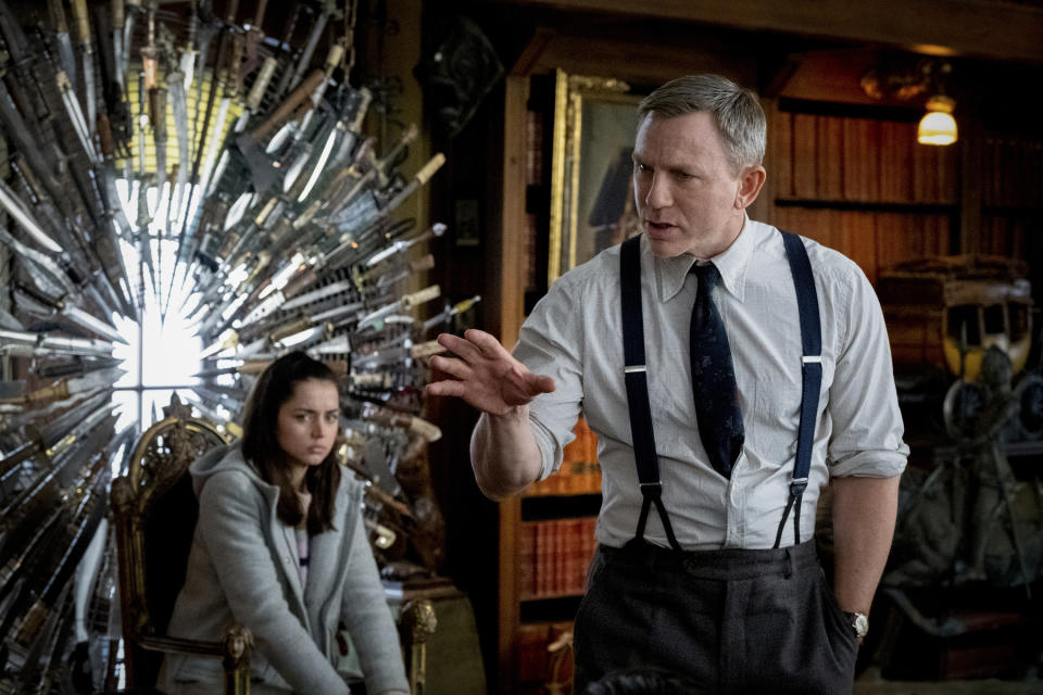 This image released by Lionsgate shows Ana de Armas, left, and Daniel Craig in a scene from "Knives Out." (Claire Folger/Lionsgate via AP)
