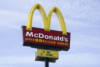 FILE - A sign is displayed outside a McDonald's restaurant, Tuesday, April 27, 2021, in Des Moines, Iowa. McDonald's announced Thursday, Aug. 10, 2022, that the company will start reopening restaurants in Ukraine in the coming months, a symbol of the war-torn country's return to some sense of normalcy and a show of support after the American fast-food chain pulled out of Russia. (AP Photo/Charlie Neibergall, File)