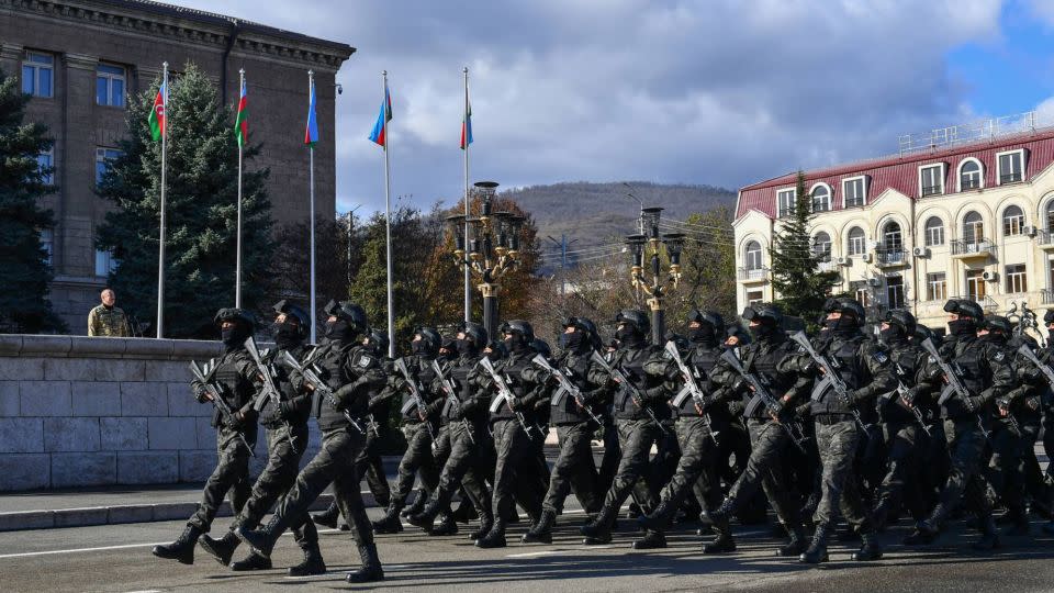 Aliyev watches over a military parade in Stepanakert, known by Azerbaijanis as Khankendi, on November 8, 2023. - Azerbaijani Presidency/Anadolu/Getty Images
