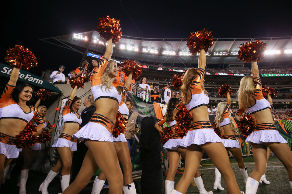 <p>Cincinnati Bengals cheerleaders walk onto the field before the NFL game against the Houston Texans and the Cincinnati Bengals on September 14 2017, at Paul Brown Stadium in Cincinnati, OH. (Photo by Ian Johnson/Icon Sportswire via Getty Images) </p>