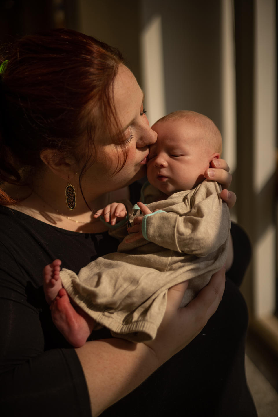 Julie Hardee holds her son Jameson at the Pennington Biomedical Research Center at Louisiana State University in Baton Rouge on May 12, 2022. (Kathleen Flynn for NBC News)