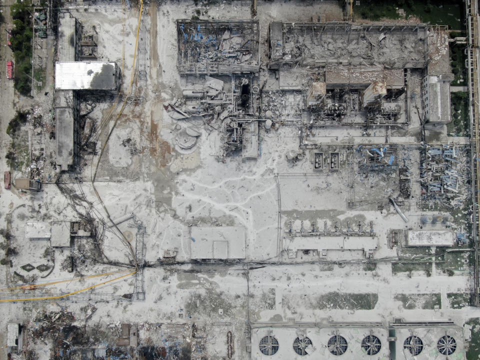 An aerial view shows the aftermath of the blast at a gas plant in Yima city in central China's Henan province Saturday, July 20, 2019. The Friday evening explosion shattered windows 3 kilometers (1.9 miles) away, and knocked off doors inside buildings, killing some and injuring others. (Chinatopix via AP)