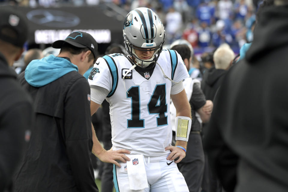 Carolina Panthers quarterback Sam Darnold (14) reacts after he was benched during the second half of an NFL football game against the New York Giants Sunday, Oct. 24, 2021, in East Rutherford, N.J. (AP Photo/Bill Kostroun)