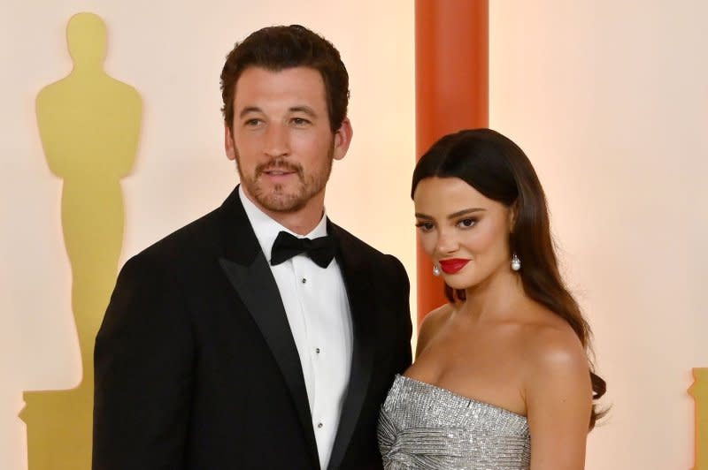 Miles Teller (L) and Keleigh Sperry attend the Academy Awards in 2023. File Photo by Jim Ruymen/UPI