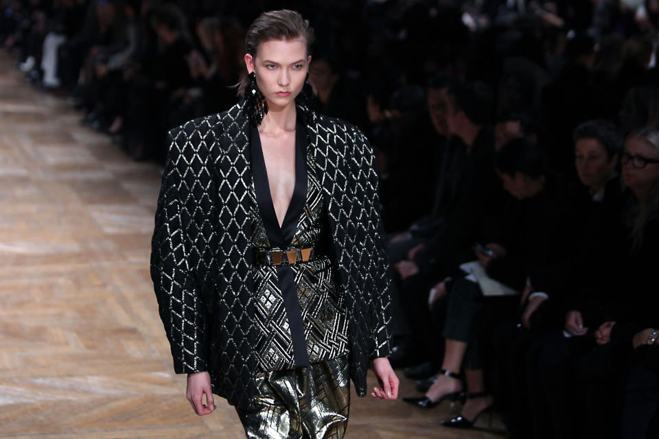 A model wears a creation by French designer Olivier Rousteing for Balmain's Fall/Winter 2013-2014 ready to wear collection in Paris, Thursday, Feb. 28, 2013. (AP Photo/Thibault Camus)