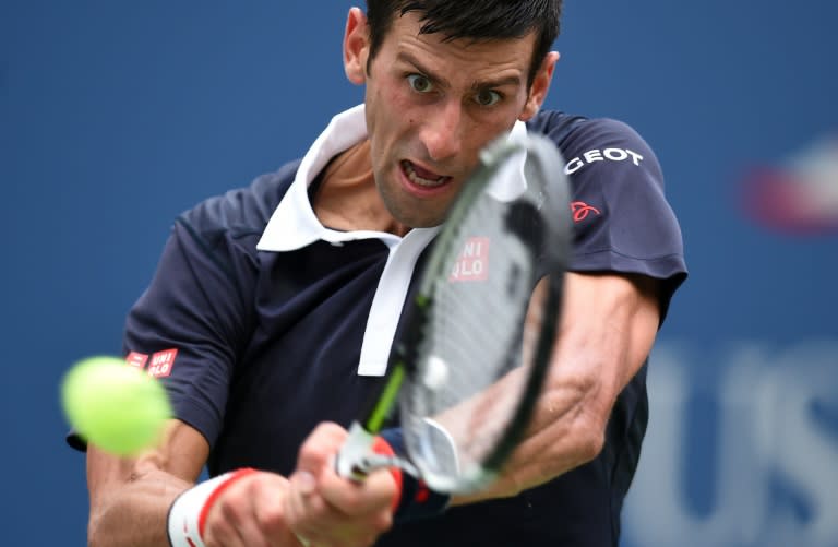 Novak Djokovic of Serbia returns the ball to Andreas Seppi of Italy during the 2015 US Open in New York on September 4, 2015