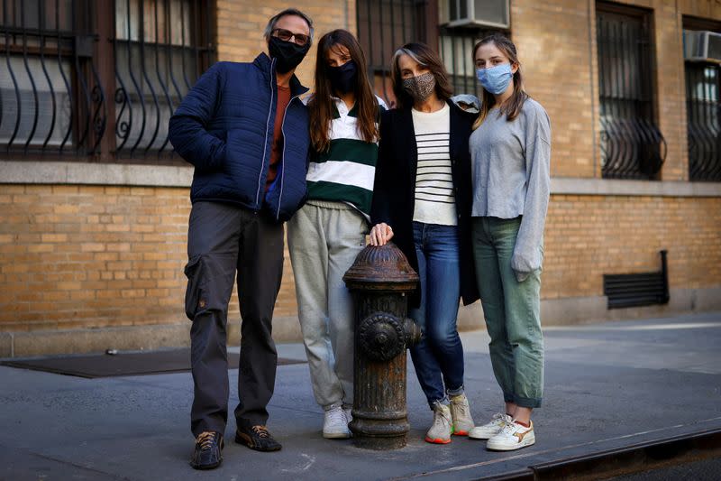 Maree Johnson-Baruch, a Broadway performer, poses with her family in New York City