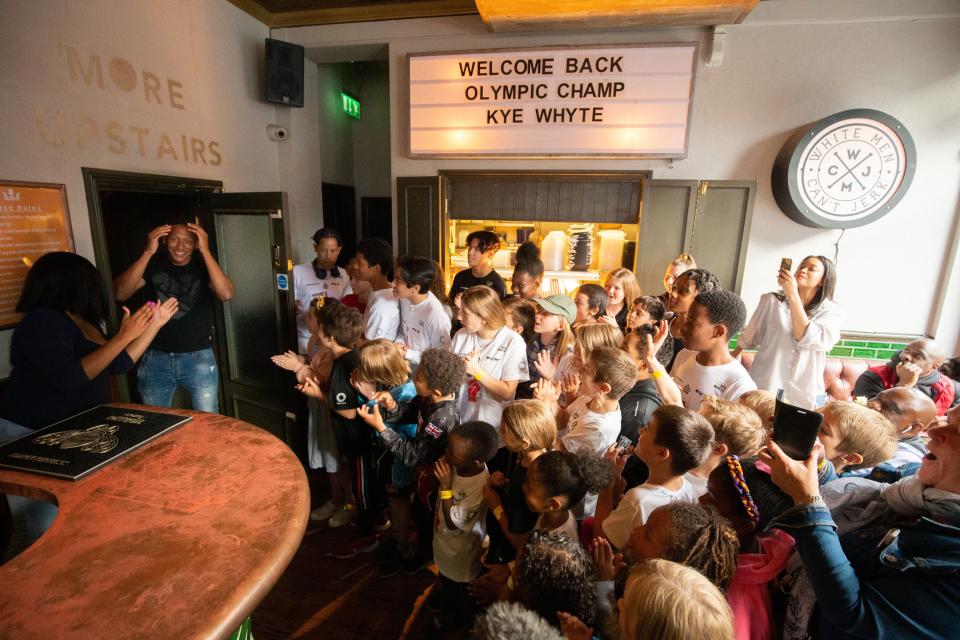 Kye Whyte received a hero’s welcome at the Prince of Peckham Pub (James Manning/PA) (PA Wire)