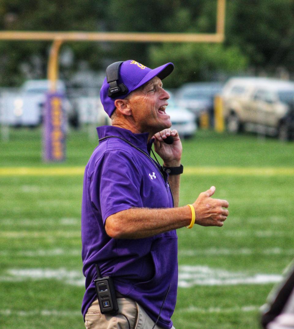 Blissfield football coach Ron Estes calls out to his team during a game against Whiteford this season.