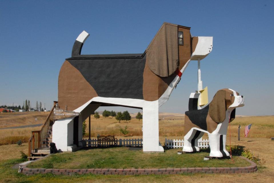 Wooden chainsaw carved art in Dog Bark Park in Cottonwood, Idaho