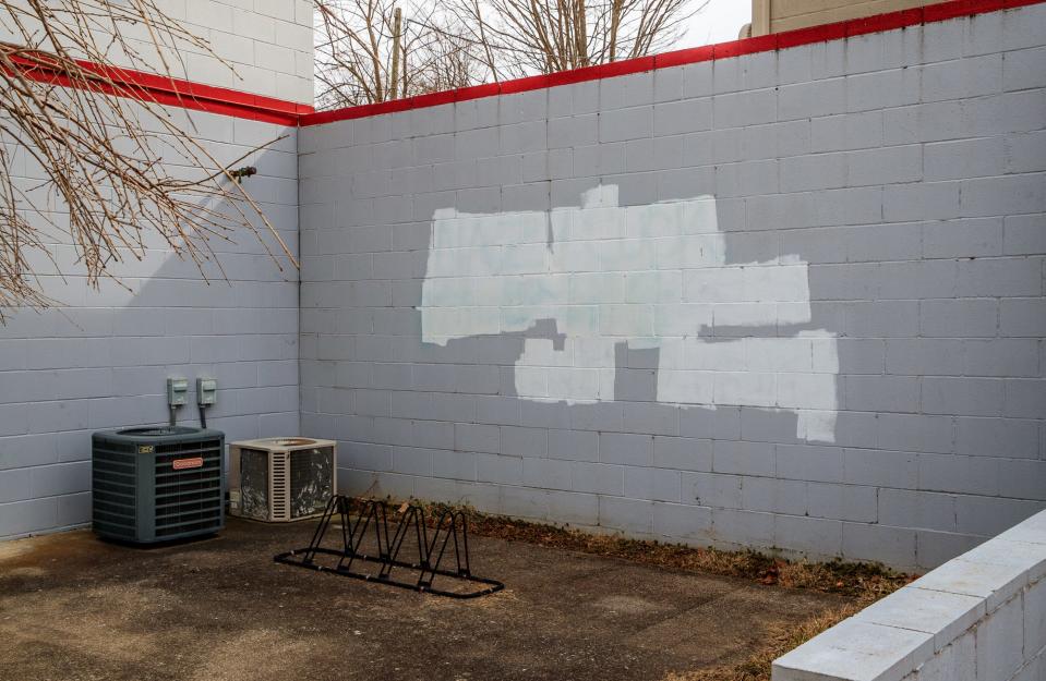 Antisemitic graffiti is covered with white paint Friday, March 4, 2022, along South Lincoln Street in Bloomington, Ind. "We have somewhere around the 7th or 8th largest Jewish student population in the country, here in Bloomington," Rabbi Sue Silberberg, executive director of The Helene G. Simon Hillel Center, said. Silberberg says there has been an alarming uptick in antisemitic instances on campus but also says that the university has been very supportive of the Jewish community. 