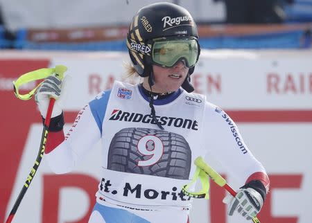 Alpine Skiing - FIS Alpine Skiing World Cup - Women's Alpine Super G - St. Moritz, Switzerland - December 9, 2017 - Lara Gut of Switzerland reacts at the finish line after crashing on the course. REUTERS/Arnd Wiegmann