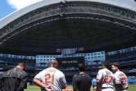 <p>A moment of silence is observed by members of the Baltimore Orioles and fans for the victims of the terrorist attacks in Orlando before the start of MLB game action against the Toronto Blue Jays on June 12, 2016 at Rogers Centre in Toronto, Ontario, Canada. (Tom Szczerbowski/Getty Images) </p>