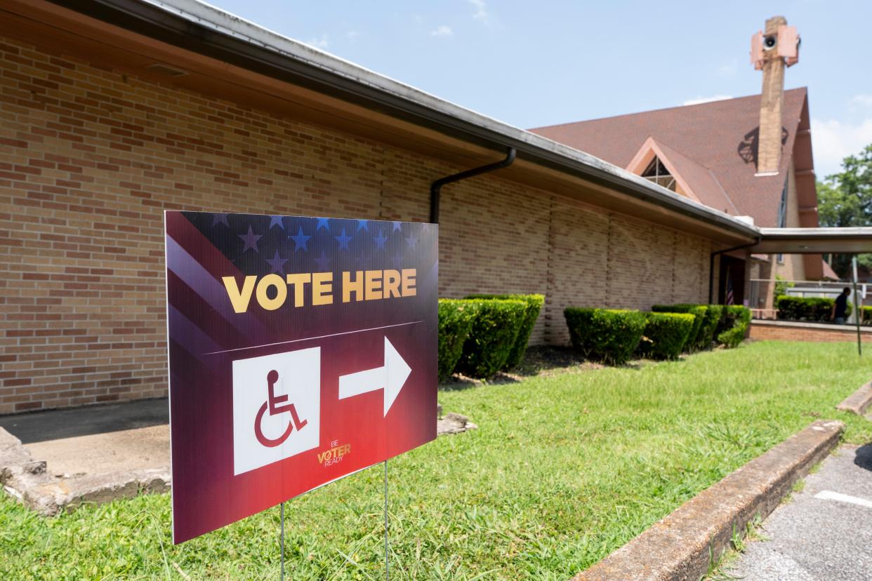 A sign for voting is seen outside of the early voting site at Greater Lewis Street Missionary Baptist Church in Memphis, Tenn., on Friday, July 12, 2024.