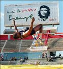 Track star Javier Sotomayor clears the bar in the high jump 16 May during the Memorial Barrientos track and field event in Havana. AFP PHOTO/Adalberto ROQUE