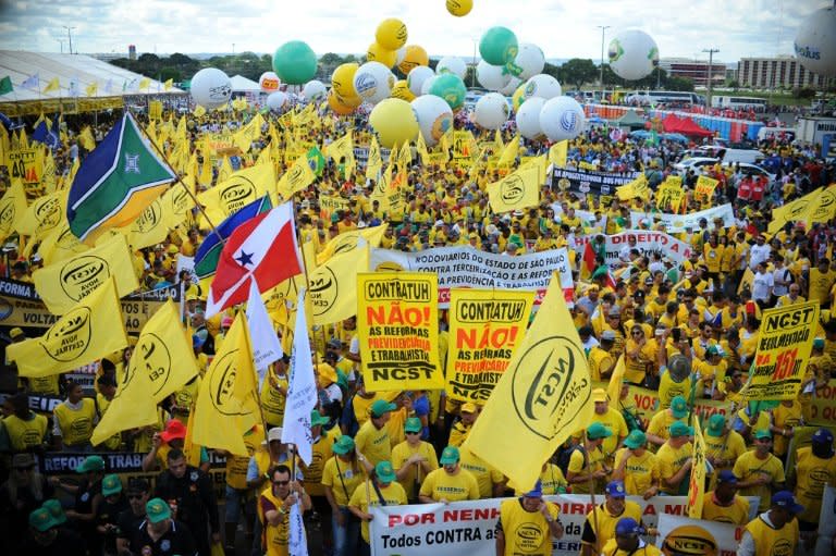 Tens of thousands of people rally against the labor and social security reforms of President Michel Temer and his government in Brasilia