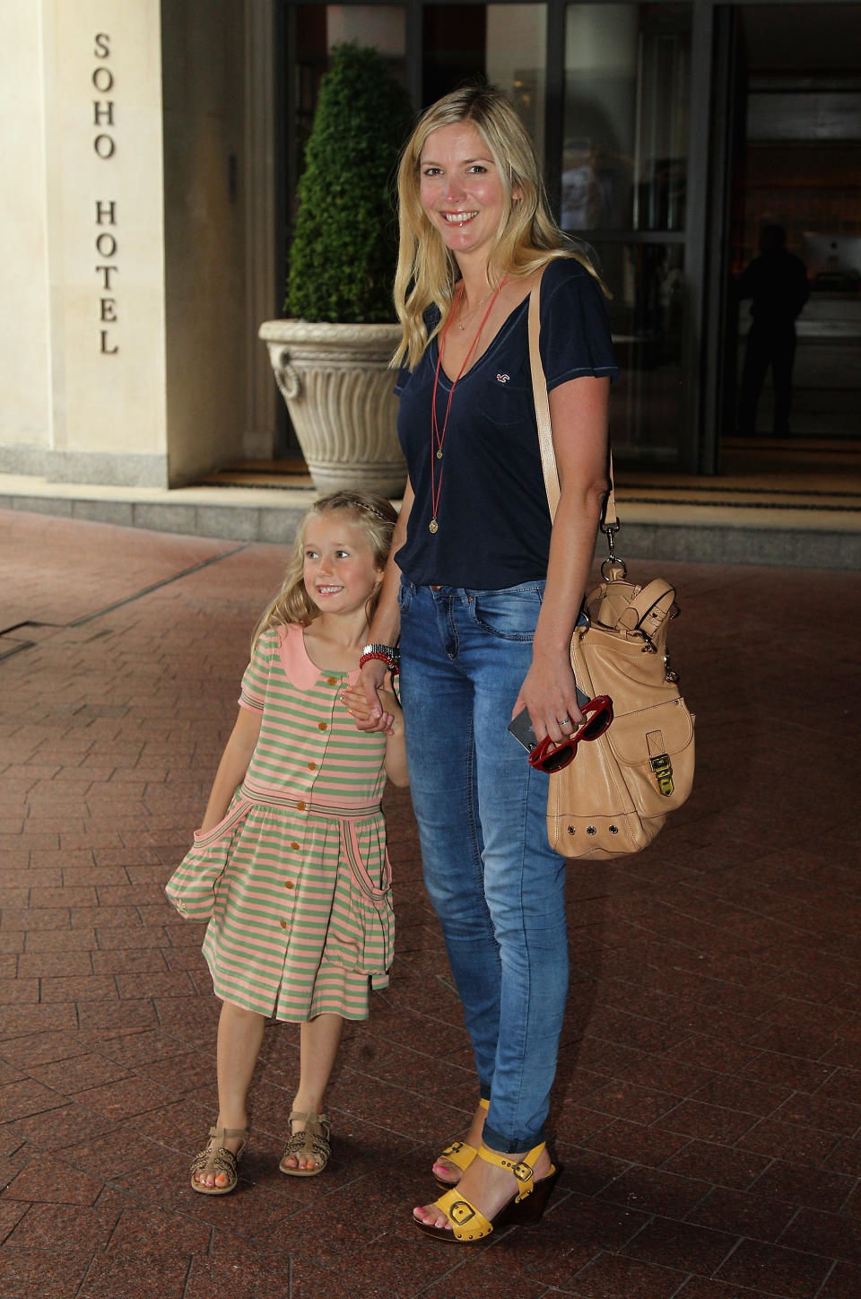 LONDON, ENGLAND - AUGUST 09:  Lisa Faulkner with her daughter Billie attend the Smurfs in 3D UK Gala Premiere and Tea Party at Soho Hotel on August 9, 2011 in London, England.  (Photo by Chris Jackson/Getty Images)