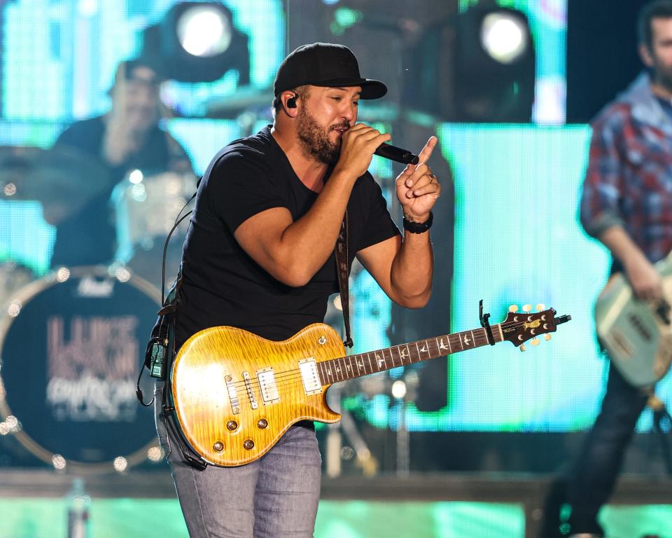 Luke Bryan performs for a large, enthusiastic crowd at his most recent Farm Tour in Colfax, Iowa, at the Schnell Family Farms on Sept. 21, 2023.