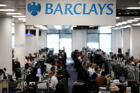 FILE PHOTO: Traders work on the trading floor of Barclays Bank at Canary Wharf in London, Britain December 7, 2018. REUTERS/Simon Dawson/File Photo