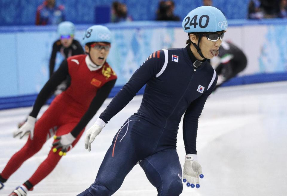 Lee Han-bin of South Korea sticks his tongue out after competing in a men's 1500m short track speedskating heat at the Iceberg Skating Palace during the 2014 Winter Olympics, Monday, Feb. 10, 2014, in Sochi, Russia. (AP Photo/Darron Cummings)