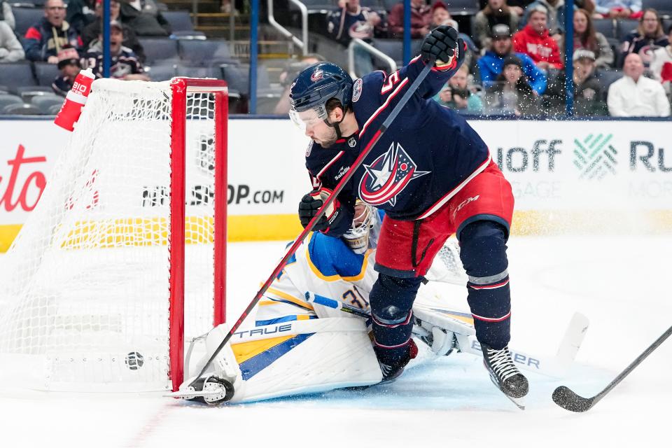 Sep 28, 2022; Columbus, Ohio, USA;  Columbus Blue Jackets center Emil Bemstrom (52) scores a goal past Buffalo Sabres goaltender Eric Comrie (31) during the first period of the NHL preseason hockey game at Nationwide Arena. Mandatory Credit: Adam Cairns-The Columbus Dispatch