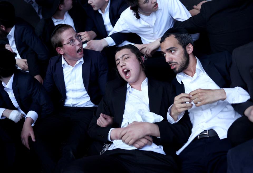 Ultra-Orthodox Jewish men protest (Eloisa Lopez / Reuters)