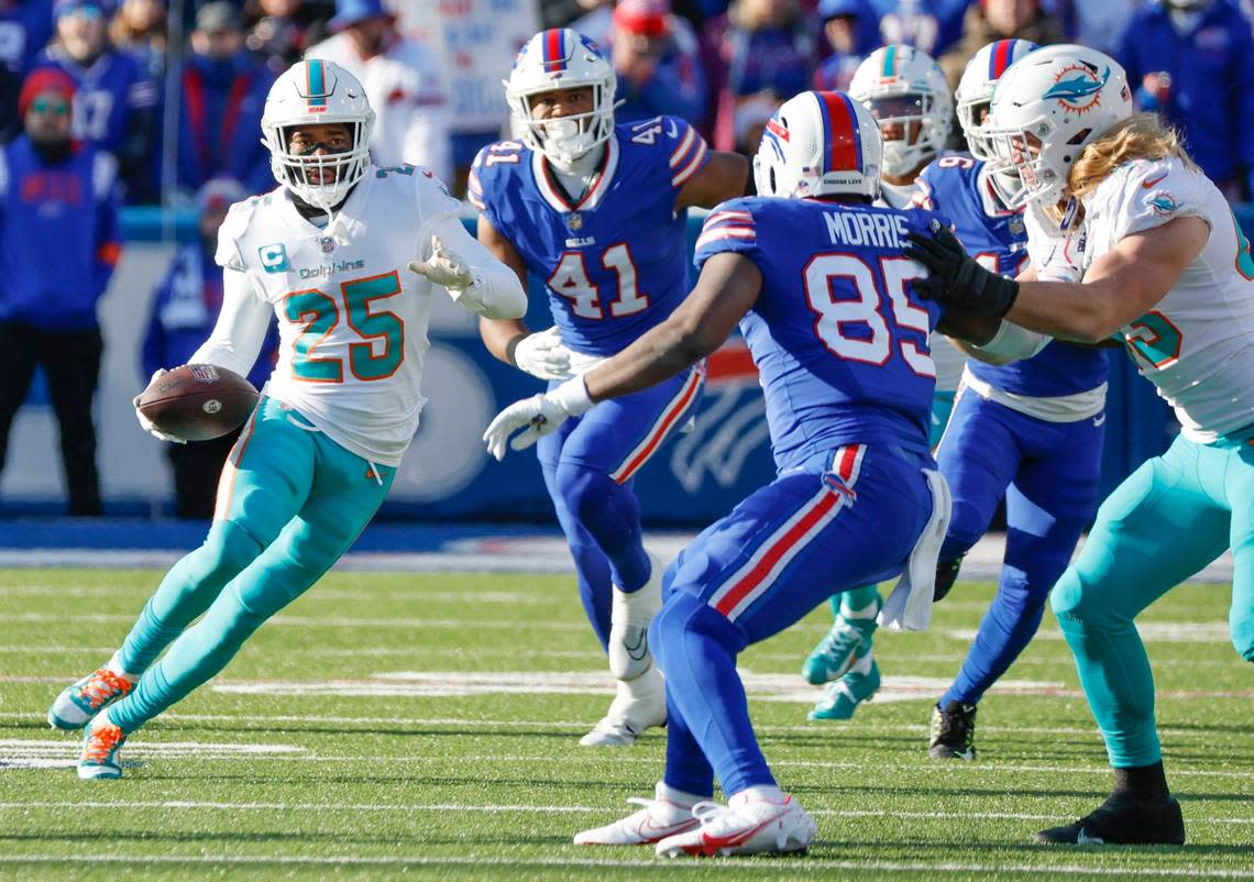 Miami Dolphins cornerback Xavien Howard (25) returns an interception against the Buffalo Bills during the NFL wild-card football game at Highmark Stadium, Orchard Park, NY, on Sunday, January 15, 2023.