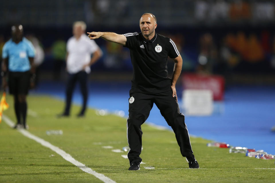 Algeria's head coach Djamel Belmadi gestures during the African Cup of Nations round of 16 soccer match between Guinea and Algeria in 30 June stadium in Cairo, Egypt, Sunday, July 7, 2019. (AP Photo/Ariel Schalit)