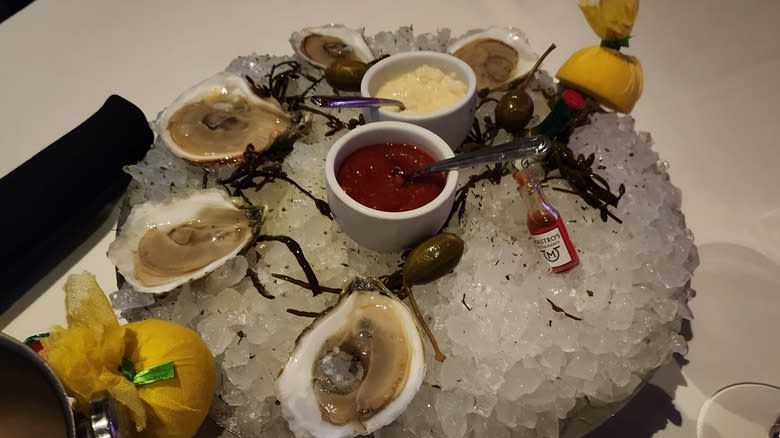 Raw oysters in ice lemon