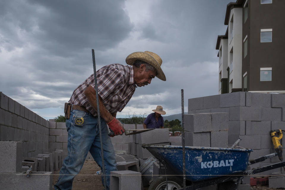 Workers at The Bluffs construction site in Los Alamos. The Bluffs will be one of the new housing developments built in Los Alamos.<span class="copyright">Ramsay de Give for TIME</span>