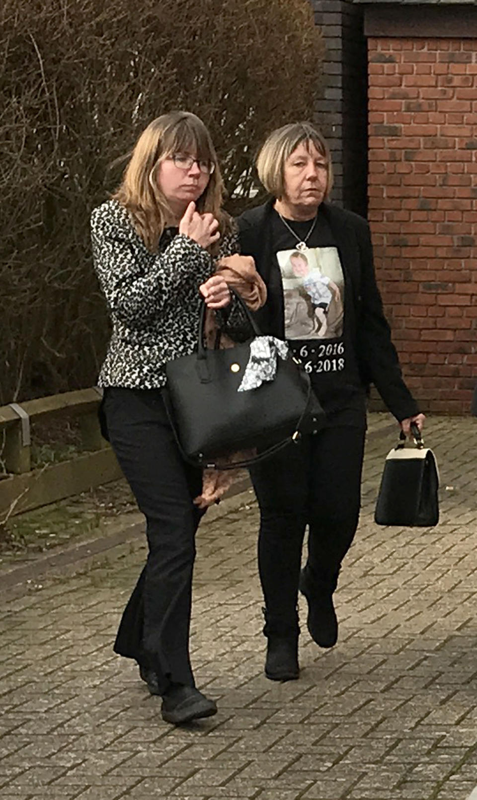 James Manning's mother Natalie Reeves (left) and grandmother Angela Knight at Centenary House in Crawley, West Sussex for the inquest into his death.