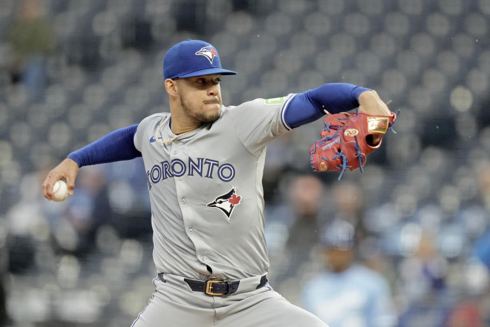 Toronto Blue Jays starting pitcher Jose Berrios throws during the first inning of a baseball game against the Kansas City Royals Thursday, April 25, 2024, in Kansas City, Mo. (AP Photo/Charlie Riedel)